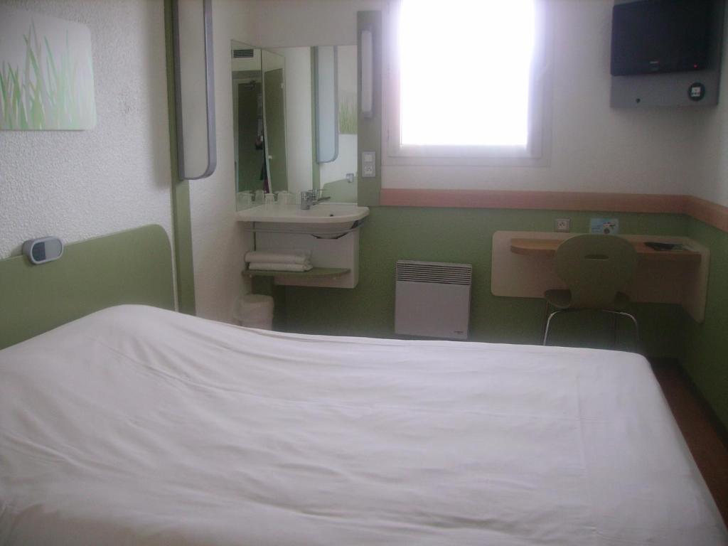 Ibis Budget Remiremont Quarto foto